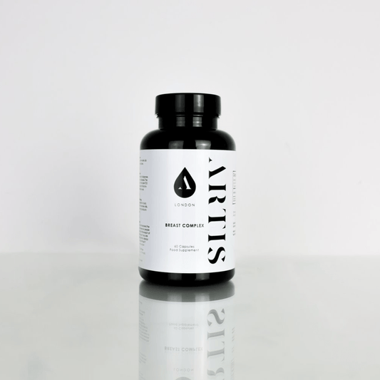 A black bottle with a white label and the text ARTIS vertically displayed.