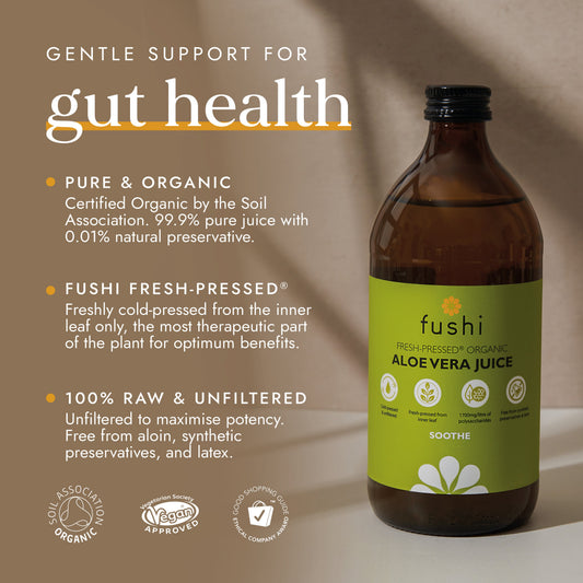 A bottle of organic apple cider vinegar with turmeric, designed for gut health.