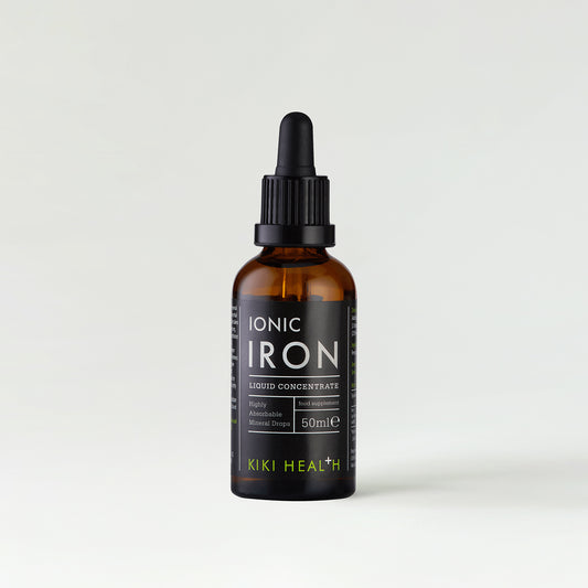 A brown glass bottle with a black dropper lid labelled Ionic Iron.