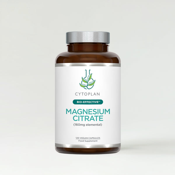 A brown bottle labelled Magnesium Citrate with a silver cap.